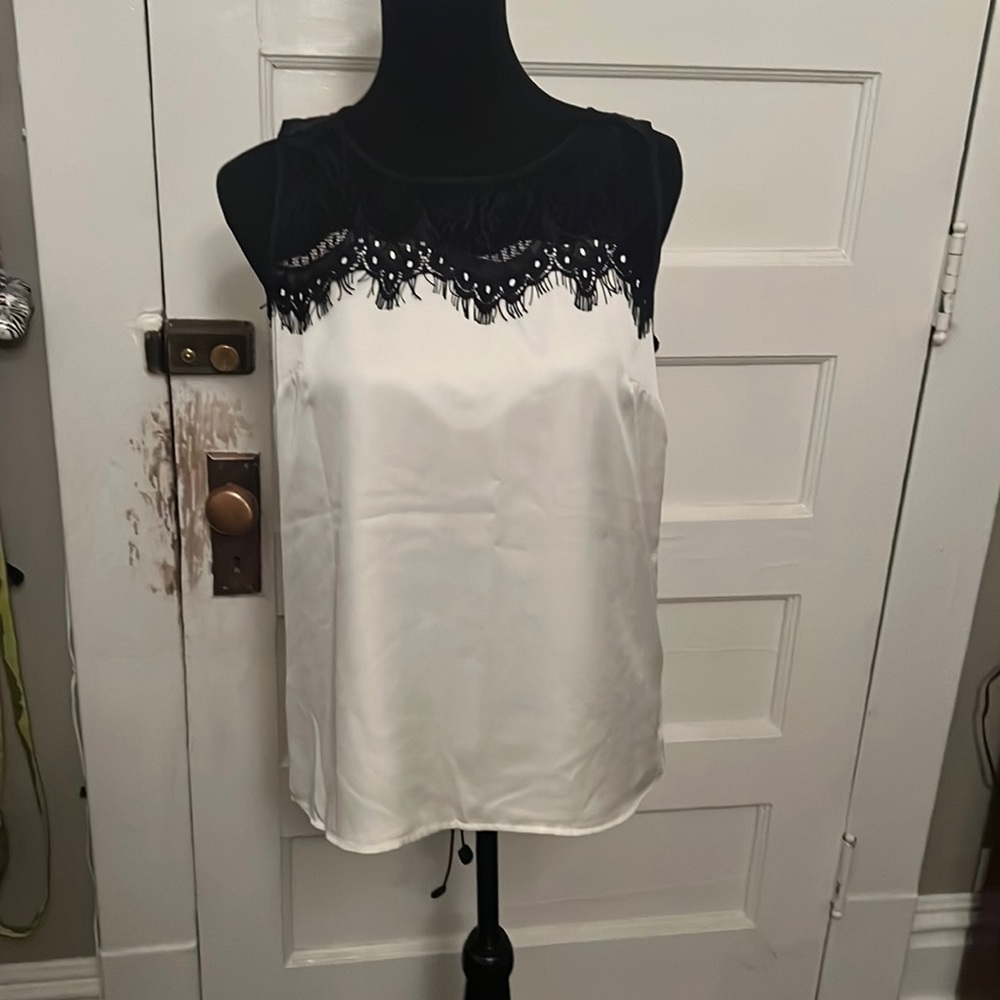 NWOT satin tank with lace trim. Size small. Perfect condition, never worn